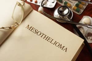 A medical book open to a chapter on Mesothelioma