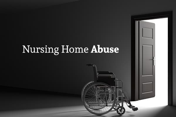 An empty wheelchair sits in a dark room, highlighted by the sunlight streaming in from the open door in front of it, and the words "Nursing Home Abuse" are written over it