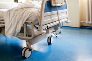 An empty hospital bed. 