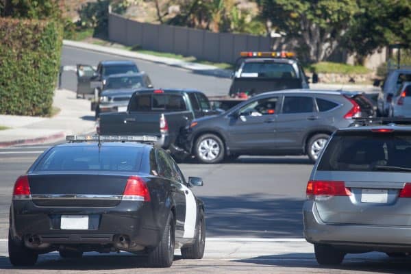 A car accident in the middle of a busy street.