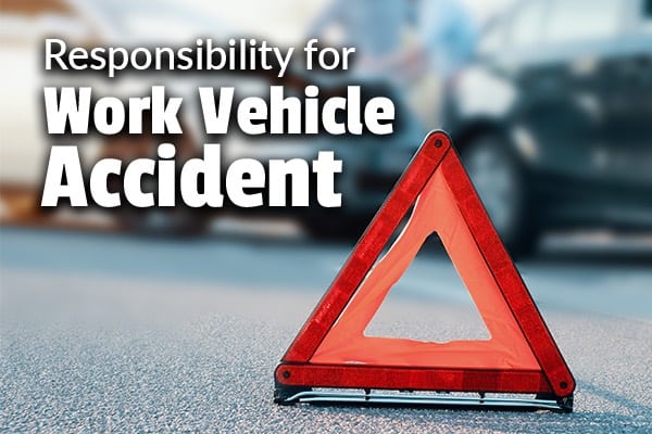 A car accident with a caution sign infant of it with the words, responsibility for work vehicle accident.