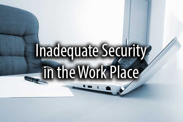 An office desk with the words, inadequate security in the work place.