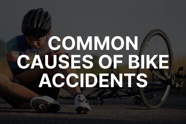 A person fallen off the bike with the words, "common causes of bike accidents."