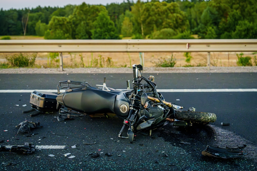 Motorcycle down on a Texas highway after a collision, illustrating the severity of motorcycle accidents and the importance of post-crash steps