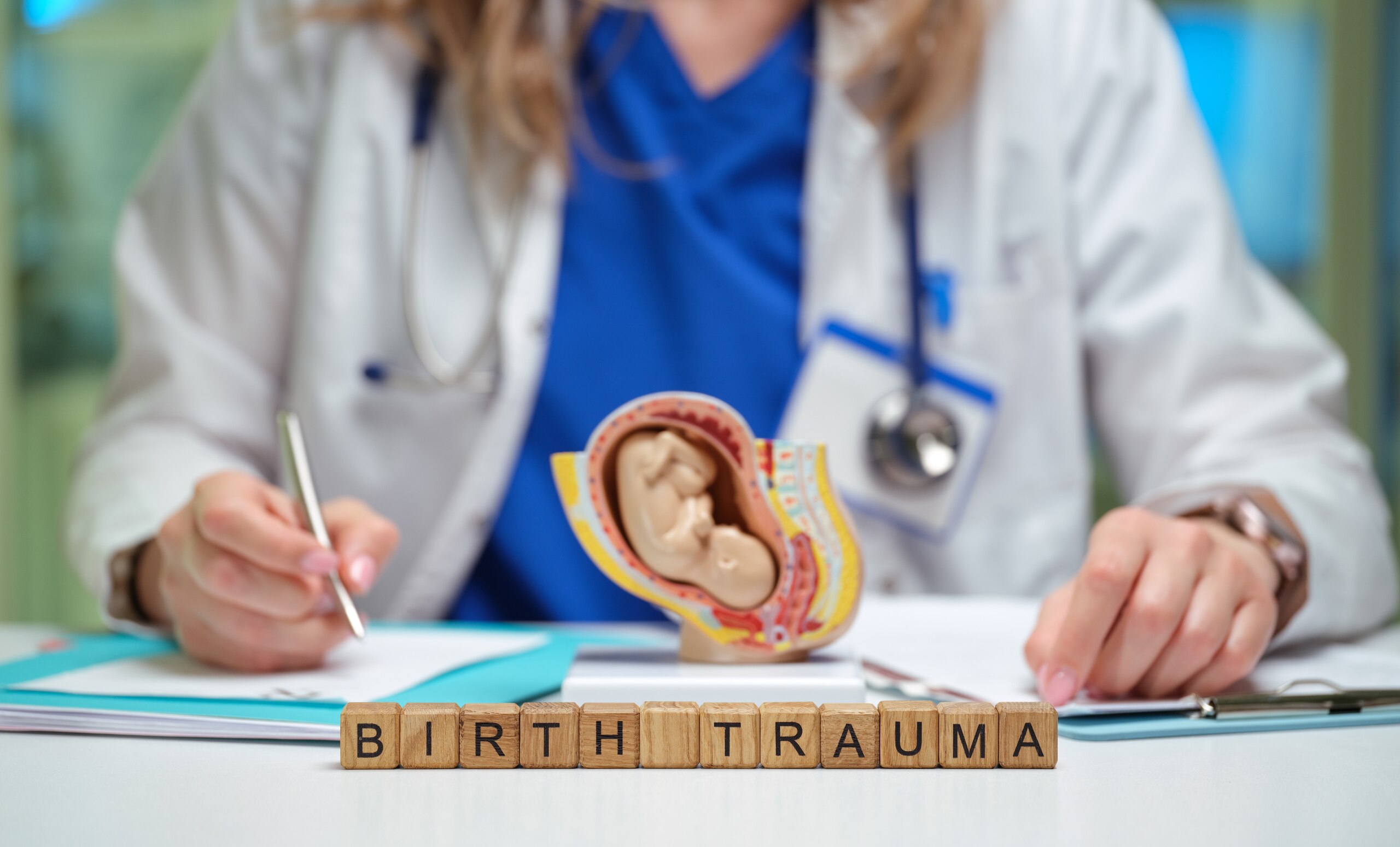 Medical professional reviewing injury case, representing legal claim after bike accident caused by road hazards in Arlington