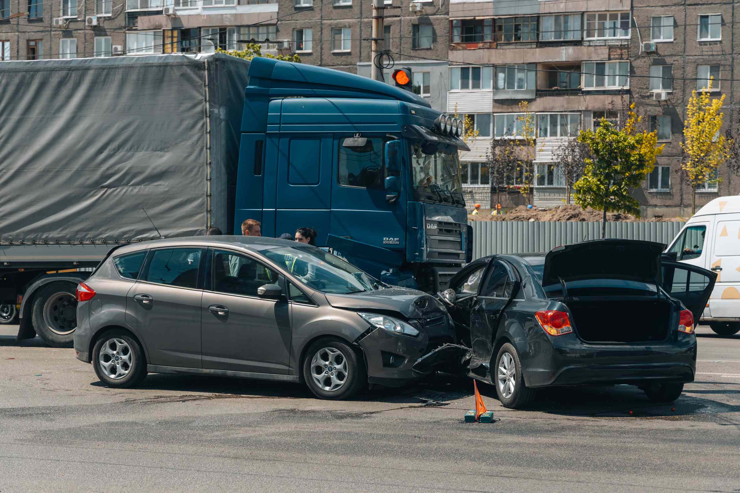 A blue semi-truck involved in a multi-car accident on a Texas road, illustrating a mechanical failure claim.