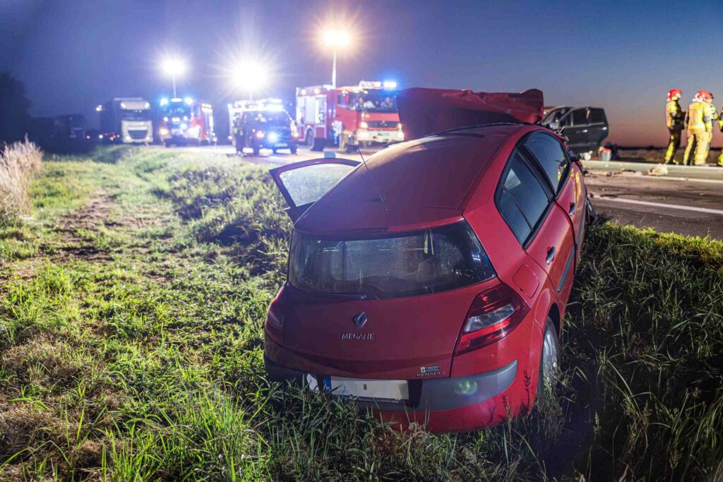 Damaged vehicle off the roadway after a crash showing a dangerous car accident scenario Arlington drivers may face on highways and rural Texas roads