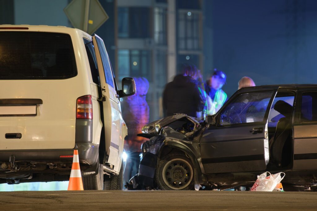 Serious nighttime car accident scene in Texas involving uninsured motorist coverage and a UM/UIM claim after major vehicle damage