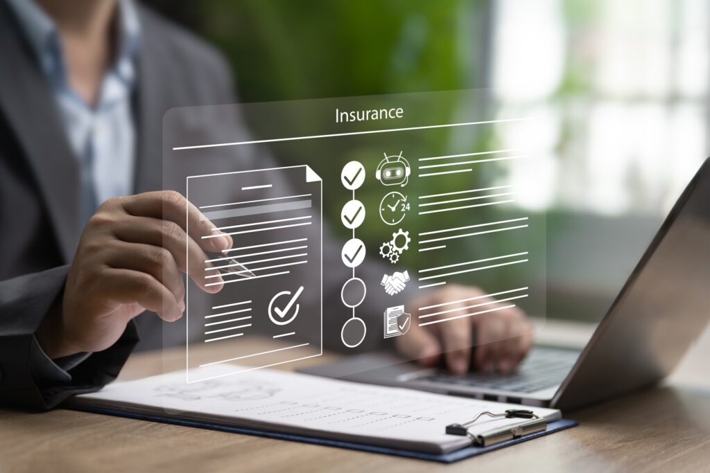Reviewing insurance policy details after an Oklahoma City uninsured motorist accident claim involving coverage and compensation issues