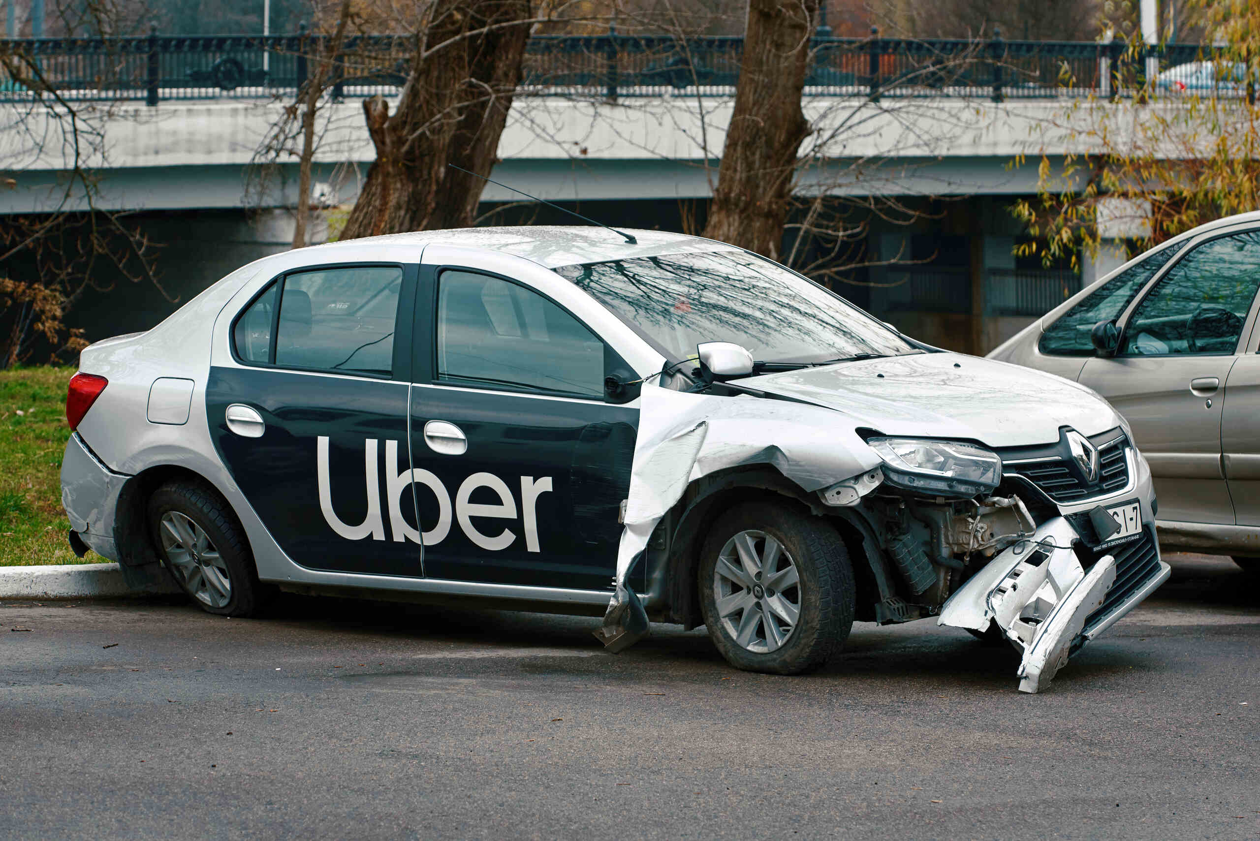 Damaged Uber vehicle after a rideshare collision related to filing a lawsuit after an Uber or Lyft car accident in Texas