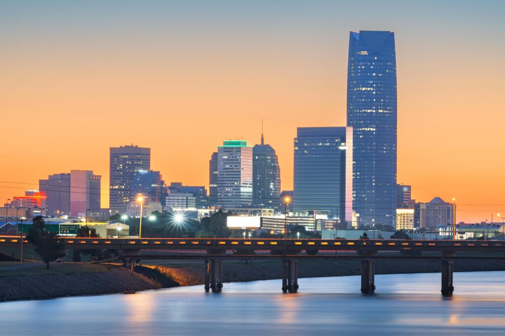 Oklahoma City skyline at sunset, legal representation by Oklahoma City burn injury attorneys.