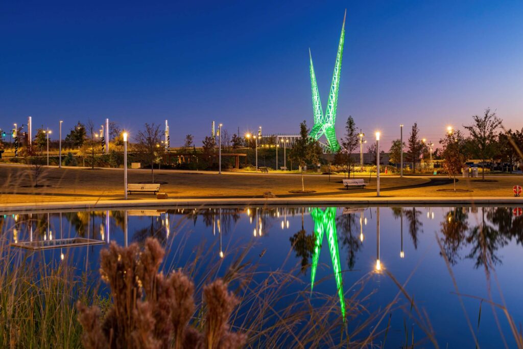 Skydance Bridge lit up at night in Oklahoma City, trusted local Oklahoma City spinal cord injury attorneys.