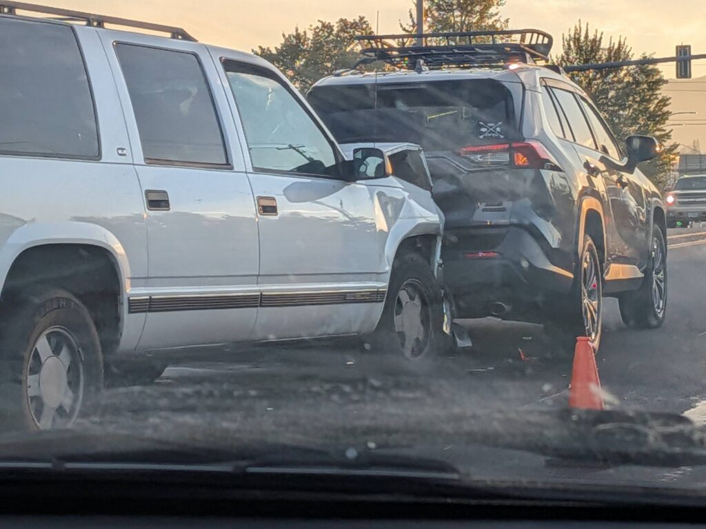 A rear end crash between two vehicles on a road raises questions about who is liable in an OKC car accident, the car owner or driver.
